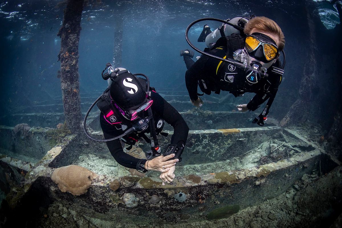 Two SCUBA divers underwater