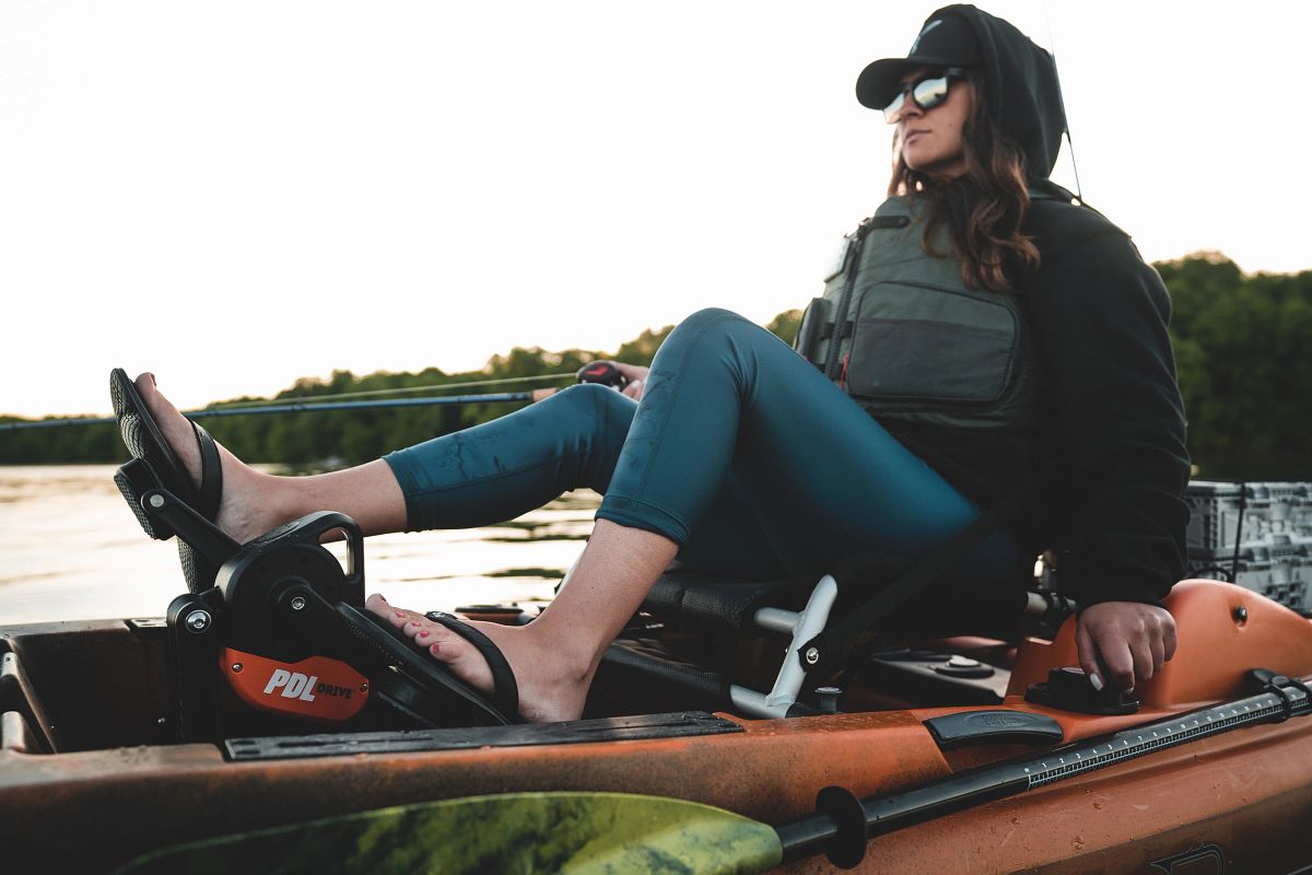 Woman in foot powered kayak