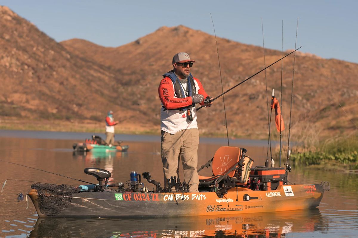 Man fishing off of kayak