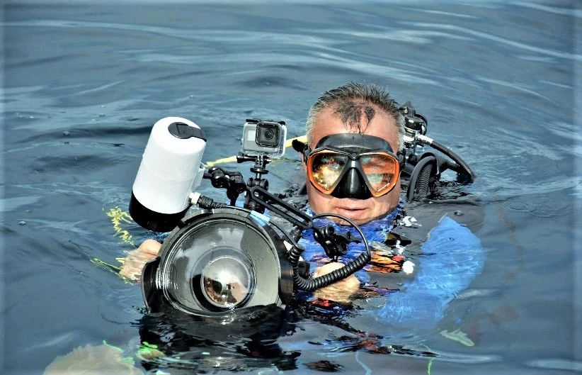 Man with underwater camera