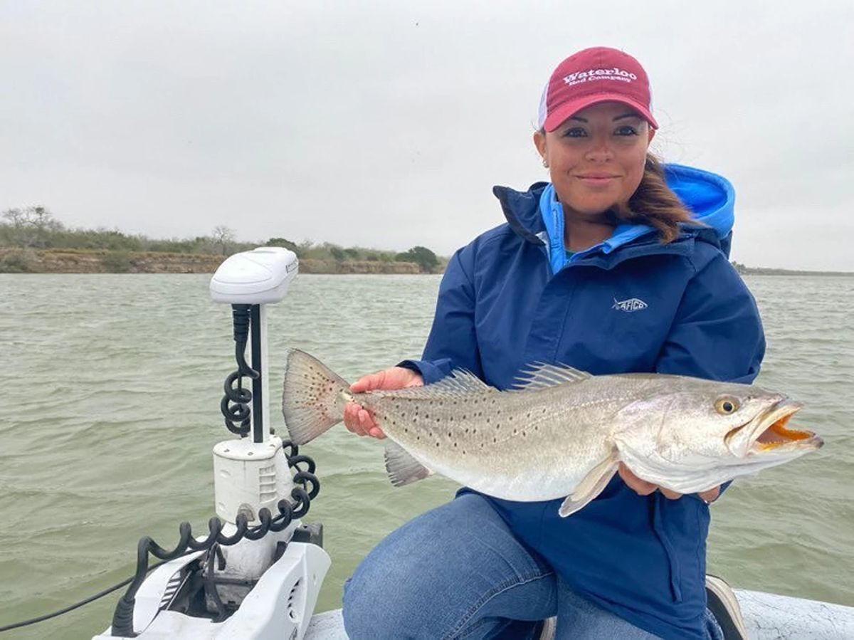 Woman holding a big fish
